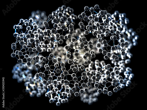 Close-up on a group of spherical nanoparticles, in glass material, with depth of field on black background