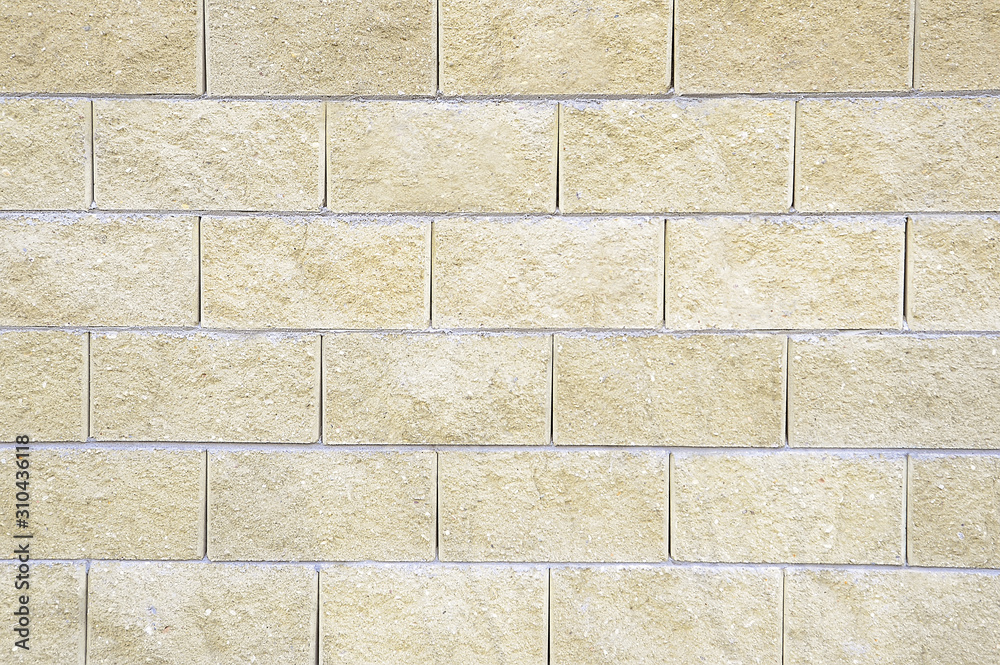 Obraz premium Old beige stone wall background texture