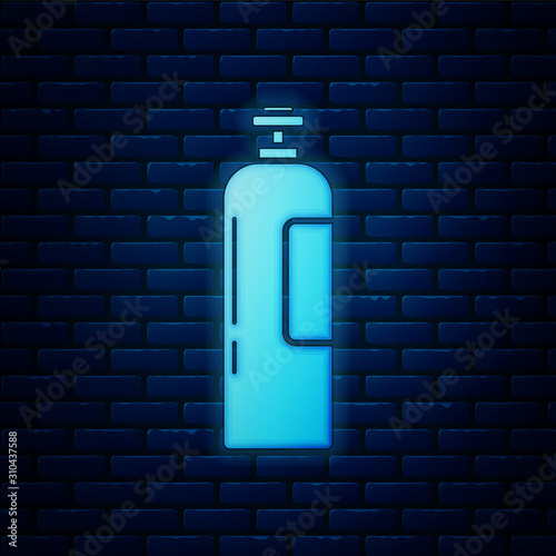 Glowing neon Industrial gas cylinder tank for all inert and mixed inert gases icon isolated on brick wall background. Vector Illustration