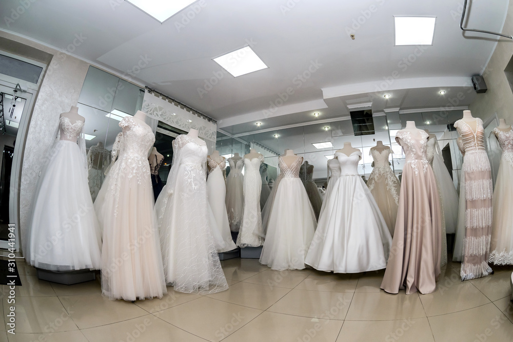 Shop interior with wedding dresses on mannequins