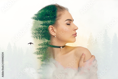 Girl portrait and forest landscape. Double exposure. Forest on the background