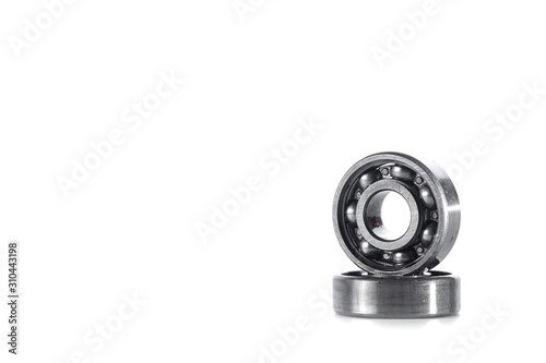 Colsed up used ball bearings isolated on white background with copy space