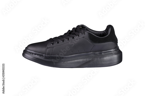 Sport shoes. Black sneaker on a white background. Shoe.