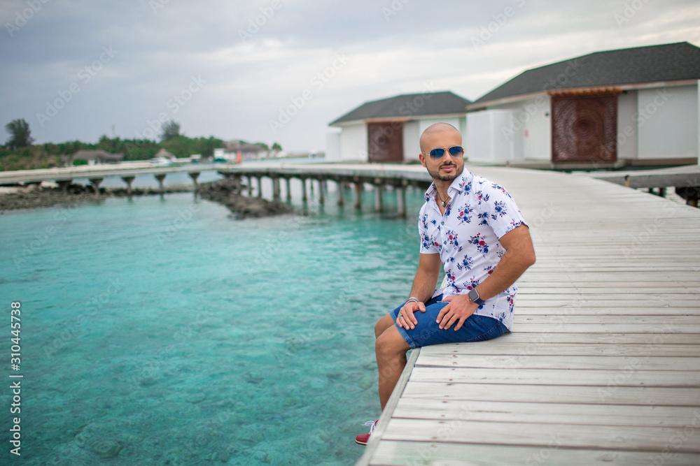 Sporty businessman on the Maldives