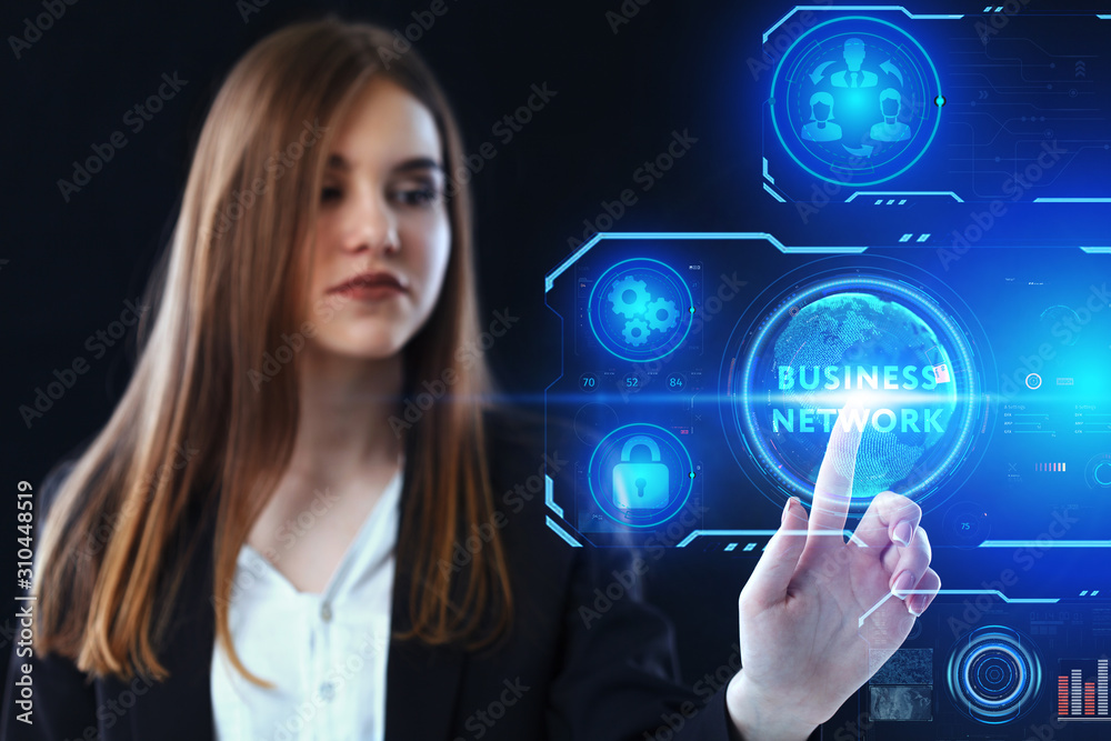 Business, Technology, Internet and network concept. Young businessman working on a virtual screen of the future and sees the inscription: Business network Business, Technology, Internet and network concept. Young businessman working on a virtual screen of the future and sees the inscription: Business network
