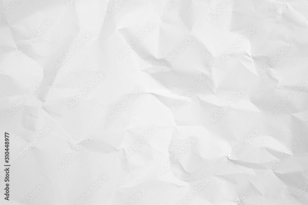 Obraz premium White crumpled paper texture background. 