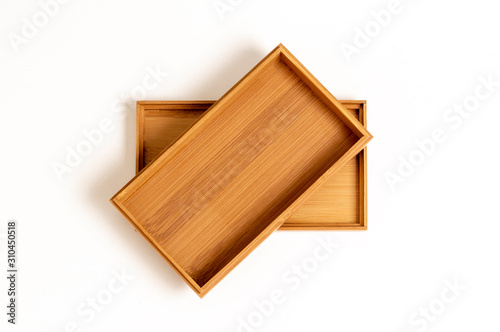 Fototapeta Naklejka Na Ścianę i Meble -  wooden box with lid on white background close up top view