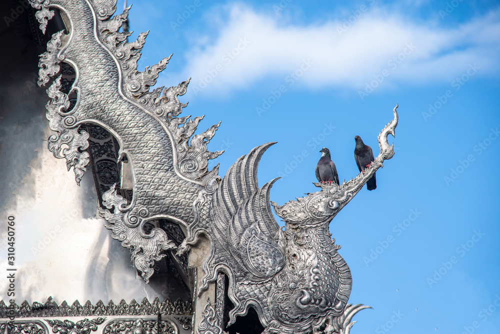 Fototapeta premium Wat Sri Suphan (Silver Temple) in Chiang Mai, Thailand. Religious traditional national Thai architecture. Landmark