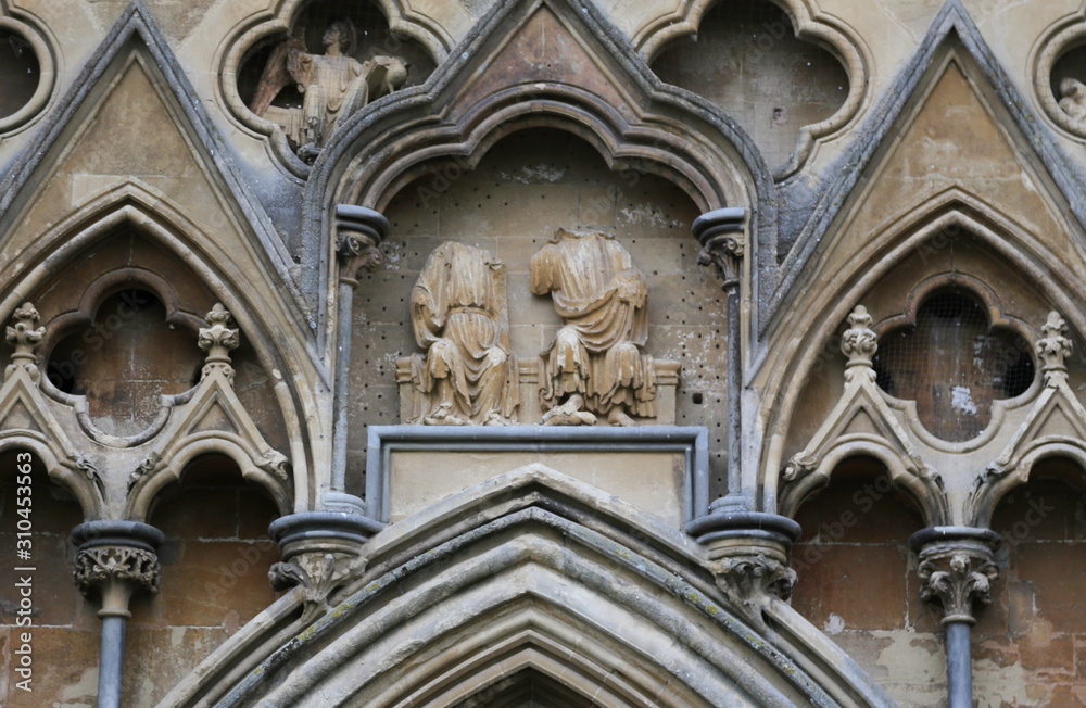 Detail of headless statues on a cathedral in Somerset, UK.  Vandalised during the Monmouth Rebellion, or Pitchfork Rebellion.