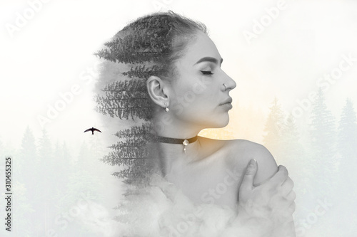 Girl portrait and forest landscape. Double exposure. Forest on the background. black and white