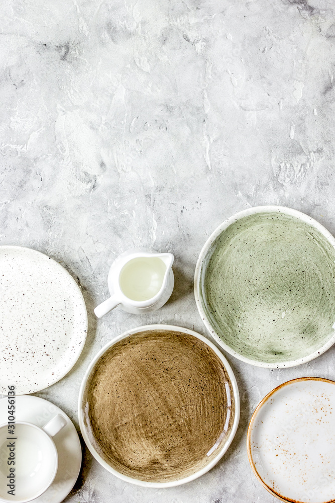 ceramic tableware top view on stone background mock up ceramic tableware top view on stone background mock up