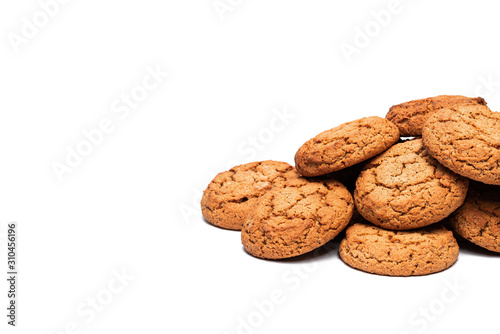 several oatmeal cookies on a white background with place for text