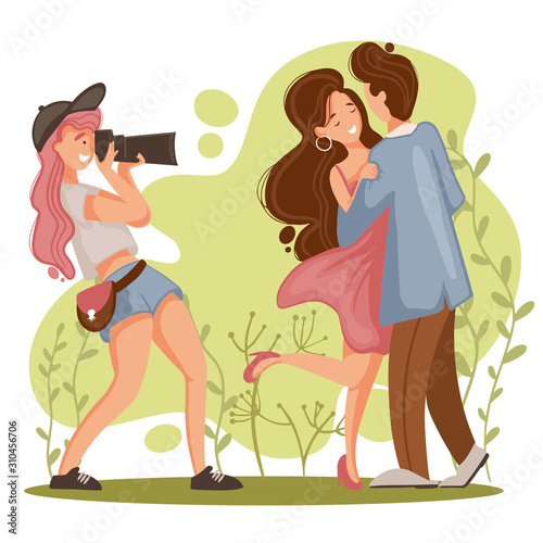 Girl photographer take a picture of a couple in love. Happy man and woman posing for romantic pre wedding photo shoot.