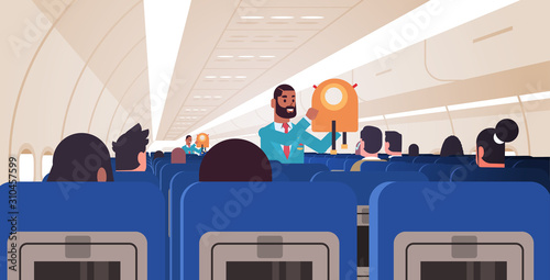 steward explaining passengers how to use jacket life vest in emergency situation african american flight attendants safety demonstration concept modern airplane board interior horizontal flat vector