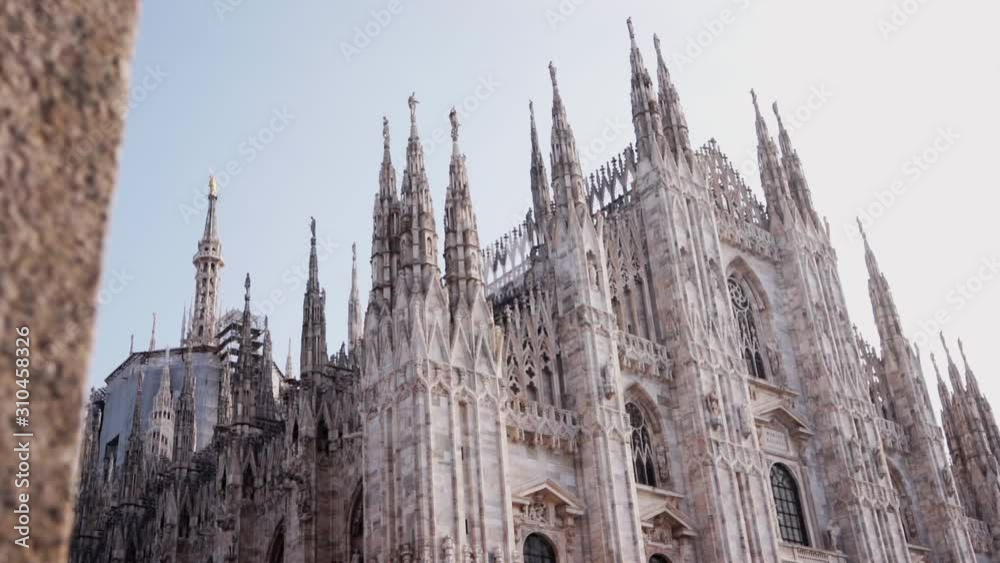 Smooth camera movement on the Duomo of Milan, Italy. Concept of europe traveling discovering art and culture. Smooth camera movement on the Duomo of Milan, Italy. Concept of europe traveling discovering art and culture.