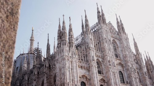 Smooth camera movement on the Duomo of Milan, Italy. Concept of europe traveling discovering art and culture.