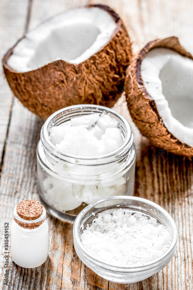 cosmetic concept with fresh coconuts on old wooden table background cosmetic concept with fresh coconuts on old wooden table background
