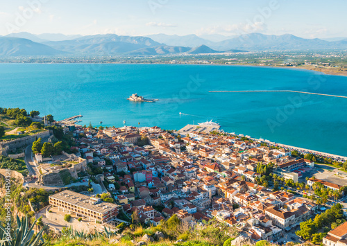Nafplio city in Greece view from above with Bourtzi castle on the island at sunset