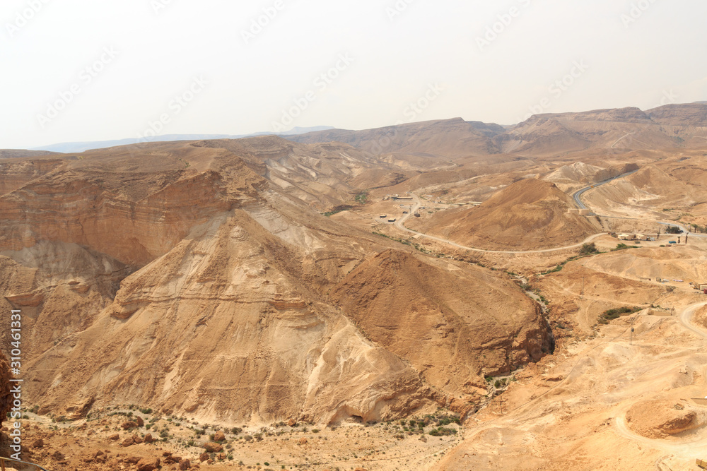 Judaean Desert mountain panorama with wadis seen from Masada fortress, Israel