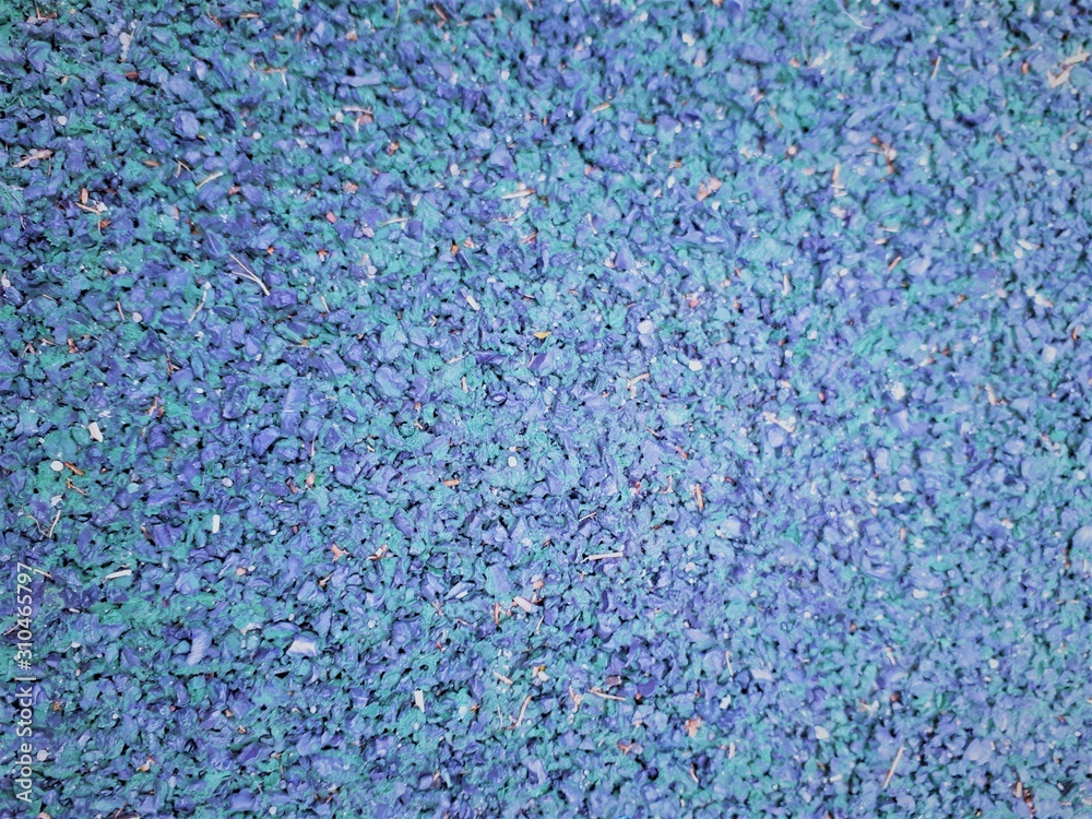 close-up of a decorative wall with bokeh effect and characteristic rough porous texture, abstract dark and light spots on a classic blue background close-up of a decorative wall with bokeh effect and characteristic rough porous texture, abstract dark and light spots on a classic blue background