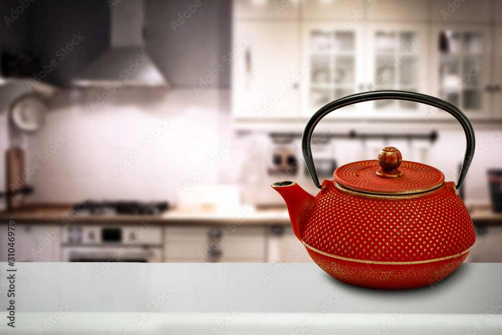 Kettle on wooden board and free space for your decoration. Kettle on wooden board and free space for your decoration.