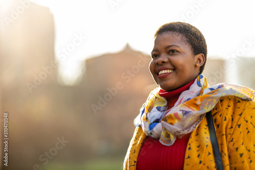 Afro american woman in an urban city area photo