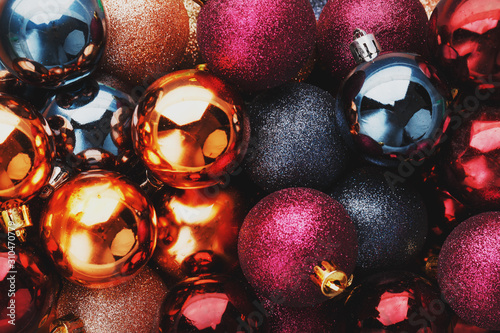 Colorful collection of Christmas Balls useful as a background patternColorful Christmas balls close up as background. photo