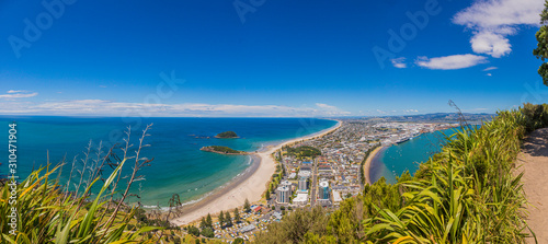 Panoramic picture of Tauranga city with Papamoa Beach from Mount Mainganui on northern island of New Zealand in summer photo