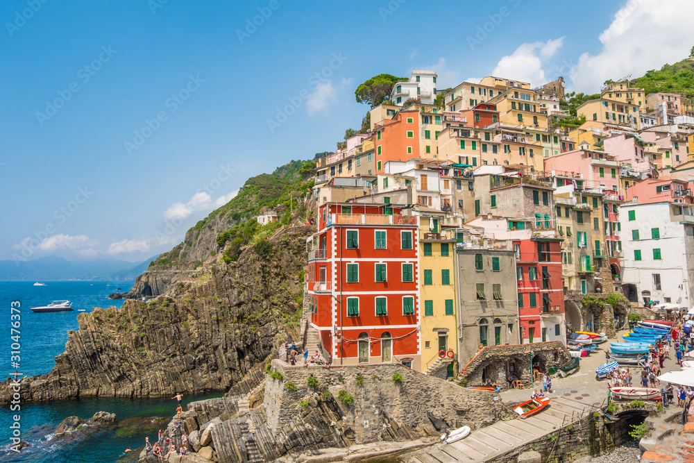Colorful Italian Village on cliffs by the sea in Cinque Terre, Italy.