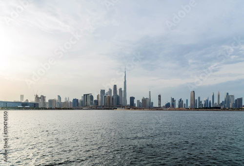 Waterfront view of Burj Khalifa, World Tallest Tower. A view from Dubai Creek Harbour, Residential and Business Skyscrapers in Downtown, Dubai, UAE © Abrar