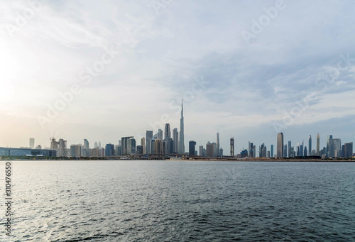 Waterfront view of Burj Khalifa, World Tallest Tower. A view from Dubai Creek Harbour, Residential and Business Skyscrapers in Downtown, Dubai, UAE