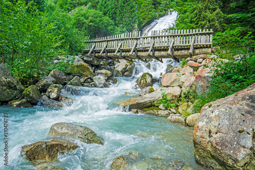 Waterfall in Italian Alps,  Amola cascata, Trentino, Italy