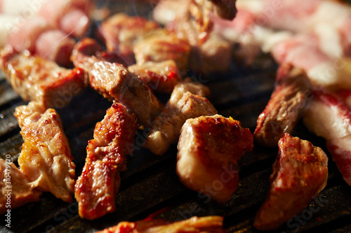 Korean BBQ, meat on iron plate 