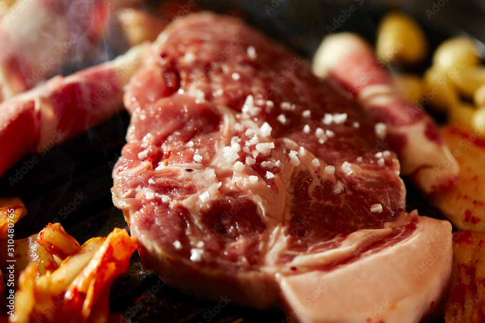 Korean BBQ, meat on iron plate Korean BBQ, meat on iron plate