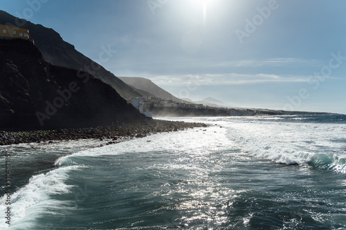 Waves on the rocky coast of Tenerife island, Canary islands, Atlantic ocean, Spain