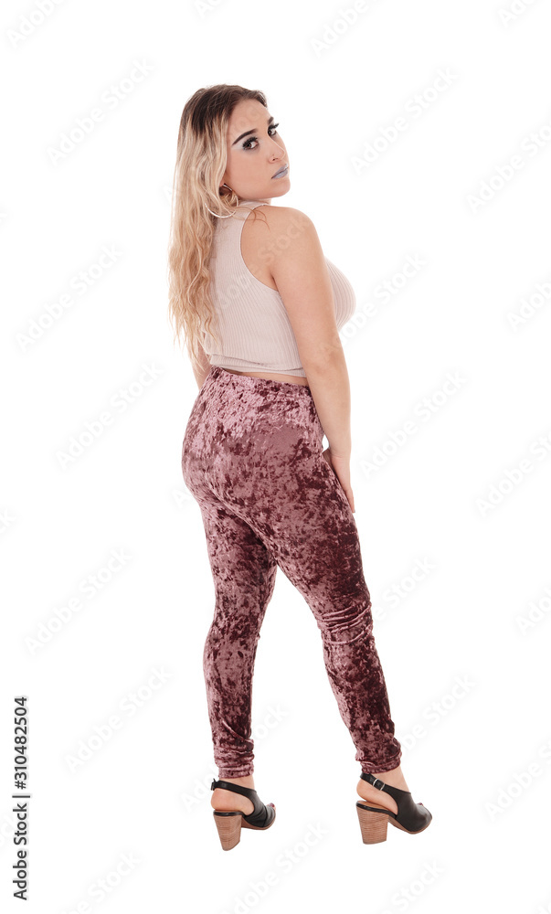 beautiful young woman standing in profile in tights beautiful young woman standing in profile in tights