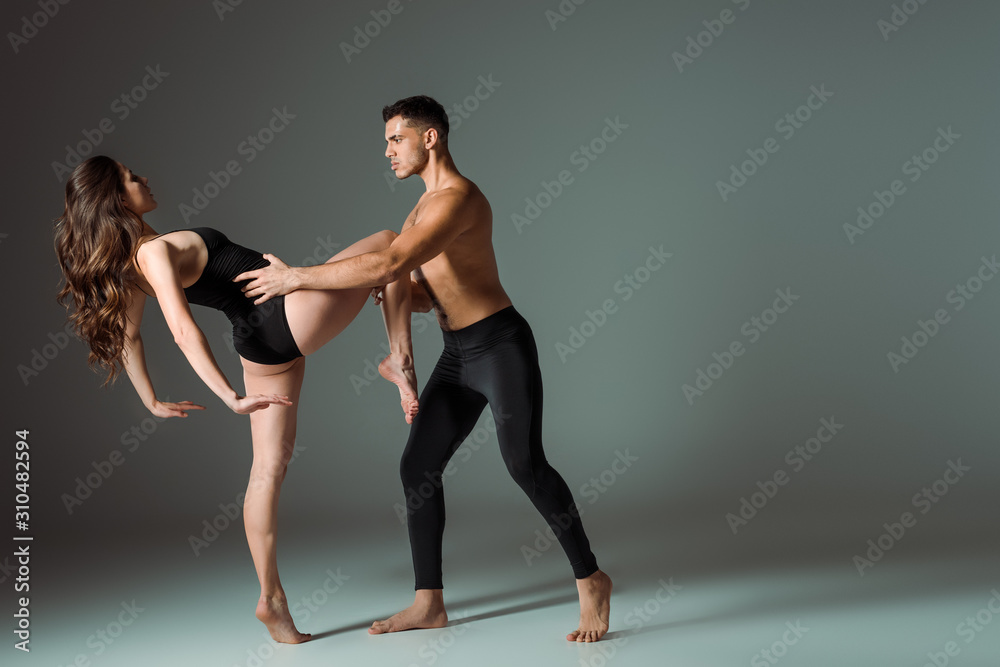 dancers dancing contemporary on dark background with copy space dancers dancing contemporary on dark background with copy space