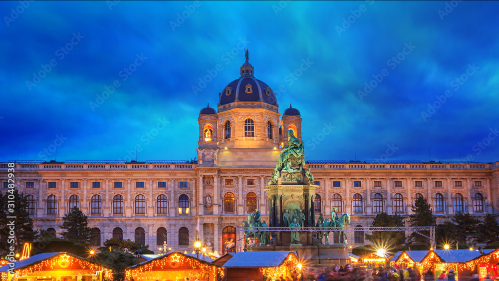 Obraz premium Festive cityscape - view of the Christmas Village on Maria-Theresien-Platz in the city of Vienna, Austria