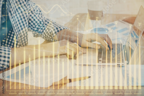 Multi exposure of stock market chart with man working on computer on background. Concept of financial analysis.