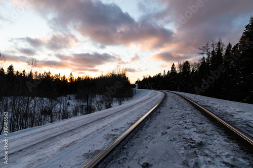 Winter train track sunset