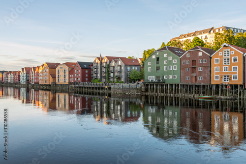 Colorful wooden buildings near Nidelva river in the city of Bakklandet Trondheim in Norway. Architecture  buildings  travel and photography concept.