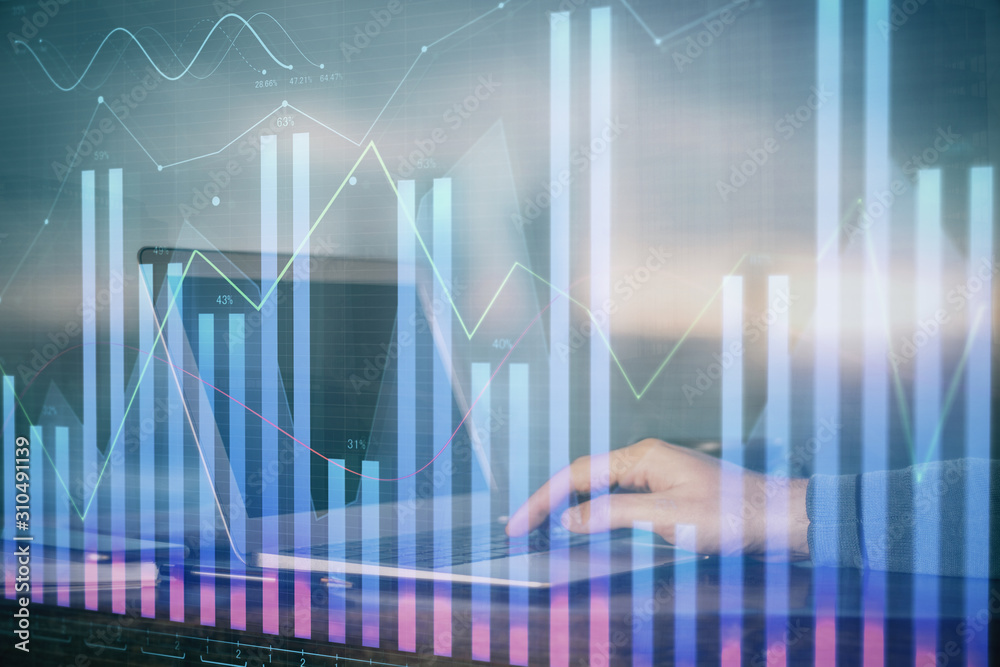 Multi exposure of market chart with man working on computer on background. Concept of financial analysis. Multi exposure of market chart with man working on computer on background. Concept of financial analysis.