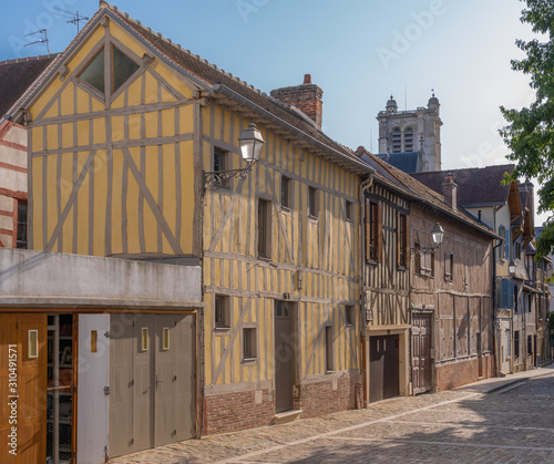 Troyes, France - 09 08 2019: Typical street with half-timbered facades