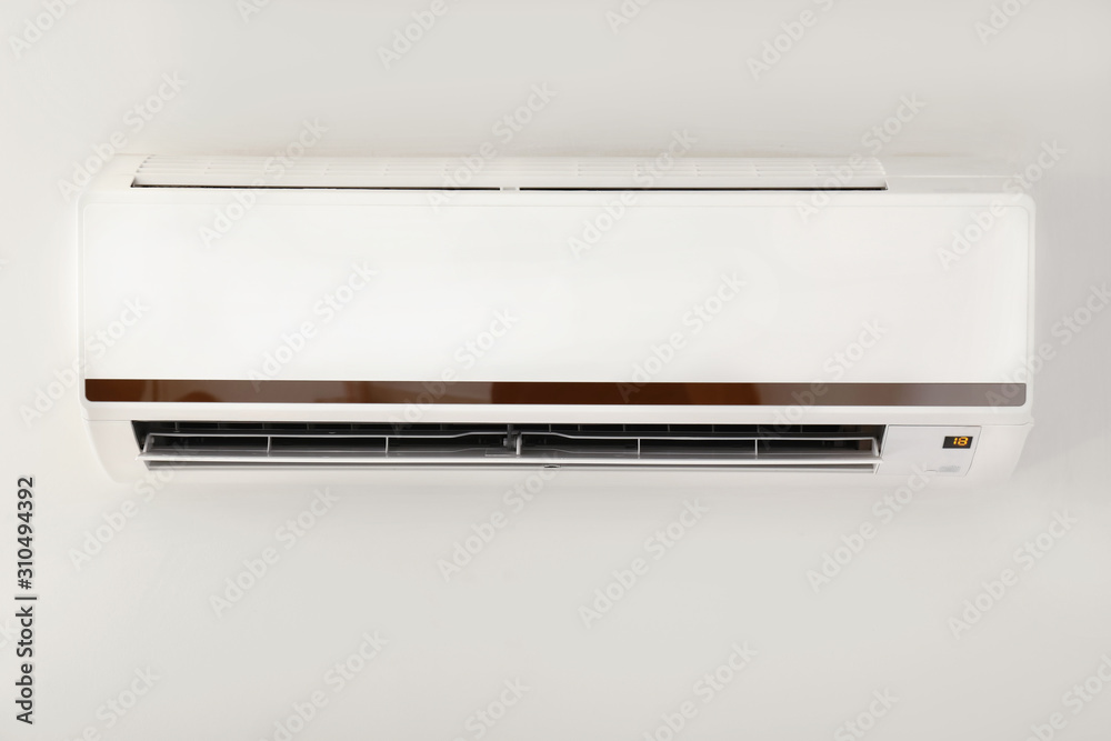 Modern air conditioner on wall Modern air conditioner on wall