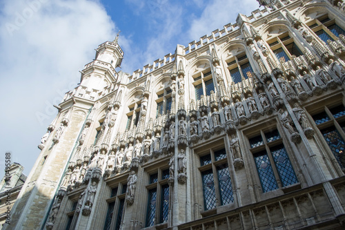The Town Hall of the City of Brussels is a Gothic building from the Middle Ages. It is located on the famous Grand Place in Brussels, Belgium. Side view from bottom to top.