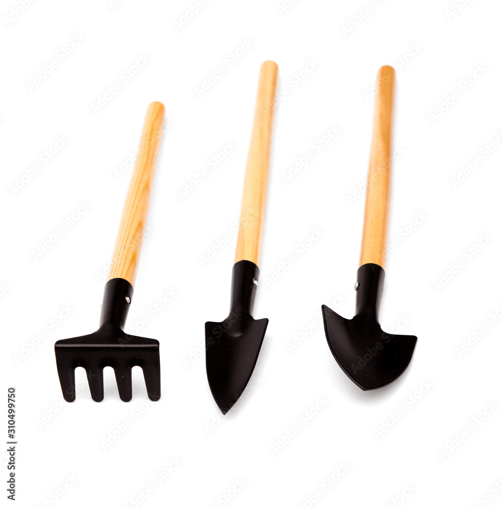 tools for gardening and irrigation flowers isolated on a white background. Garden tools isolated on white tools for gardening and irrigation flowers isolated on a white background. Garden tools isolated on white