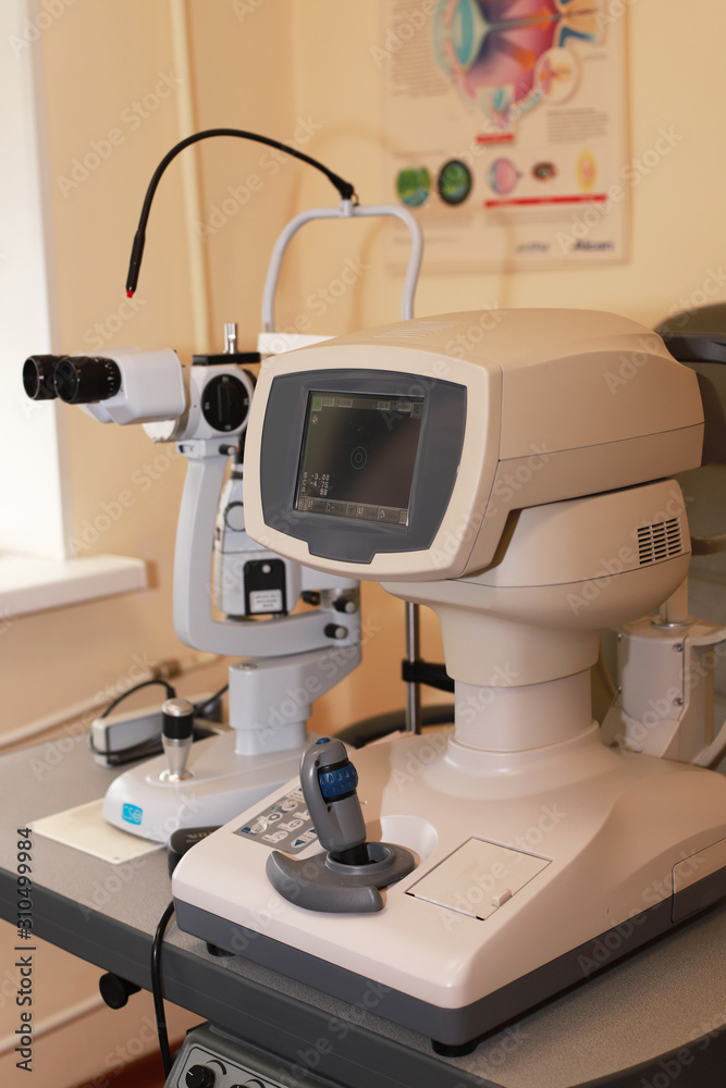 refractometer eye test machine in ophthalmology in clinic. Auto Refractometer with computer monitor, medicine devices. timely care of vision. prophylactic medical examination.