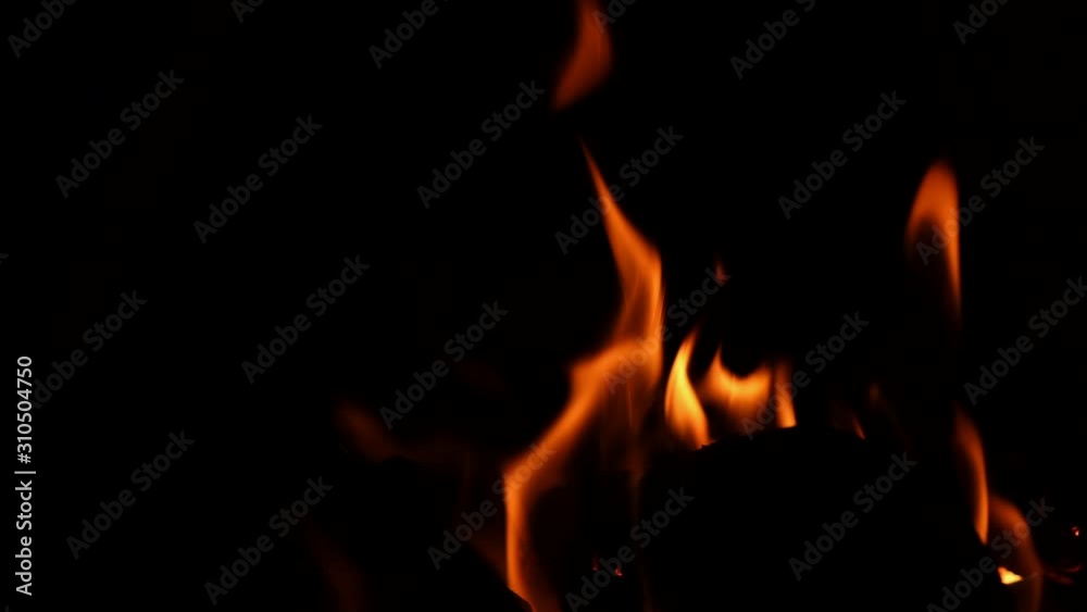 Closeup of firewood burning in fireplace. Closeup of firewood burning in fireplace.