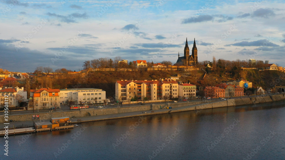 Aerial view of Vesehrad over river Vltava at sunset light in winter time in Prague, Czech republic