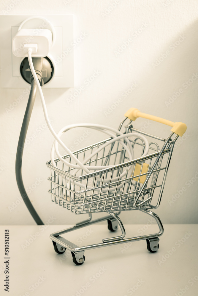 electricity price increases, Concept, Shopping trolley with cable and  electrical outlet Stock Photo | Adobe Stock